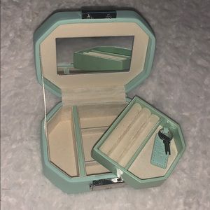 A leather travel jewelry case